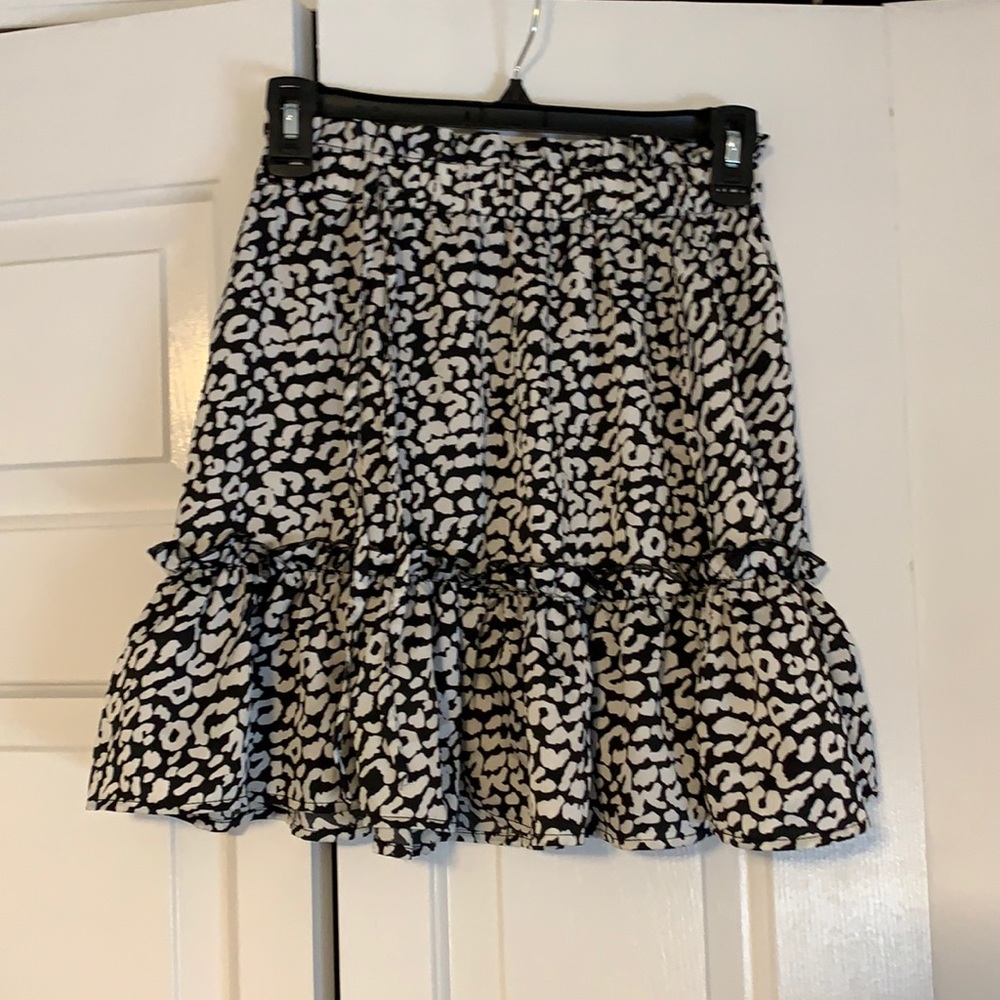 She in ruffle miniskirt size Small.